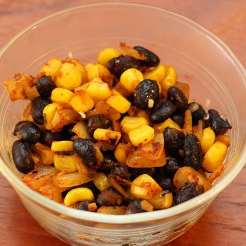 single side dish serving of tex mex mix with black beans.